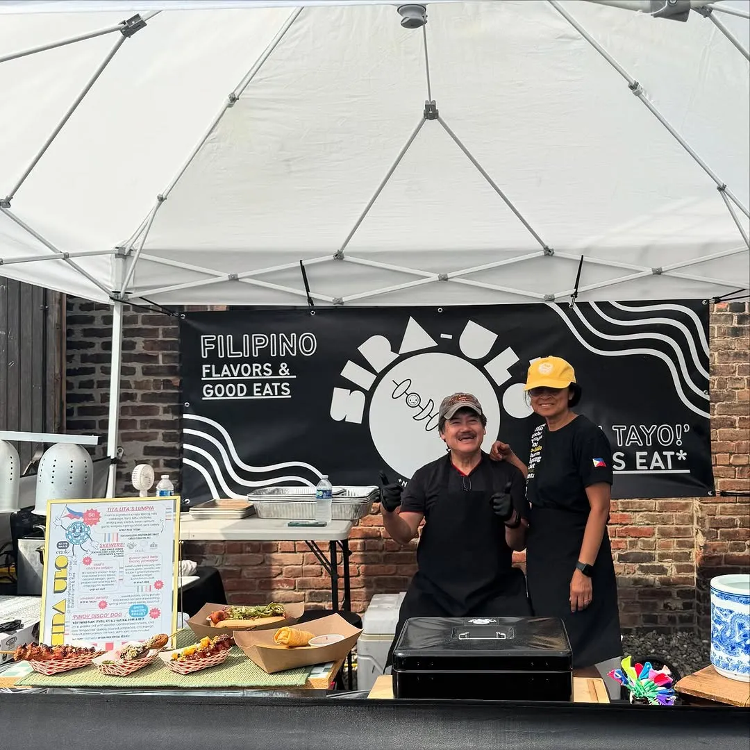 Jesseca and Harrison at the Sira Ulo pop-up booth