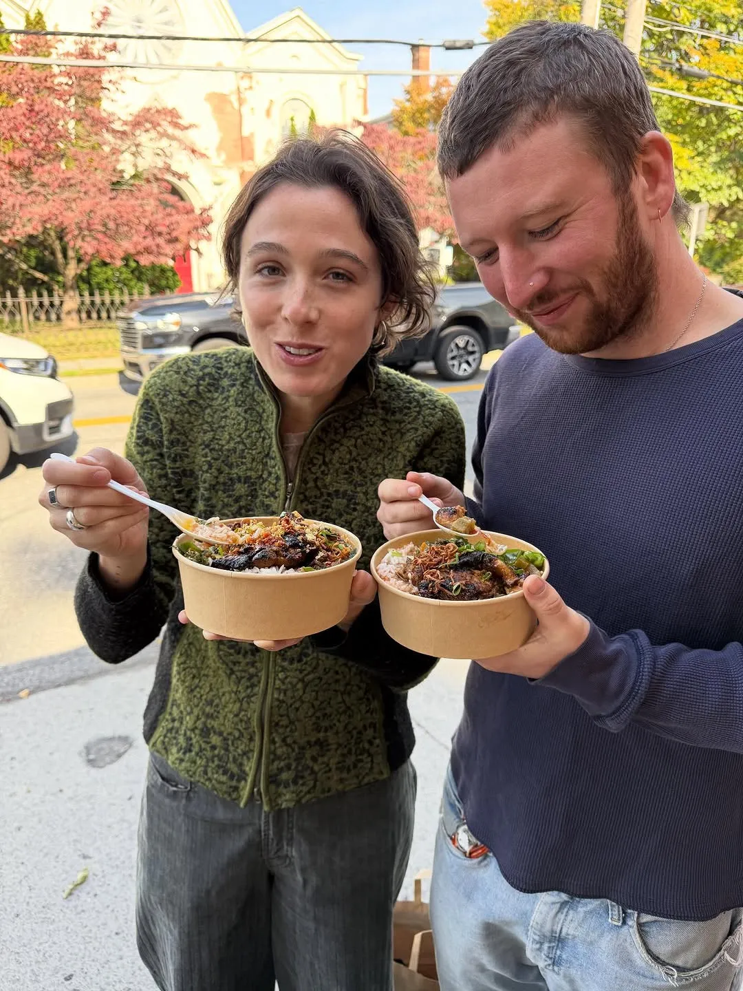 Couple enjoying Sira Ulo bowls on a fall afternoon in the Catskills