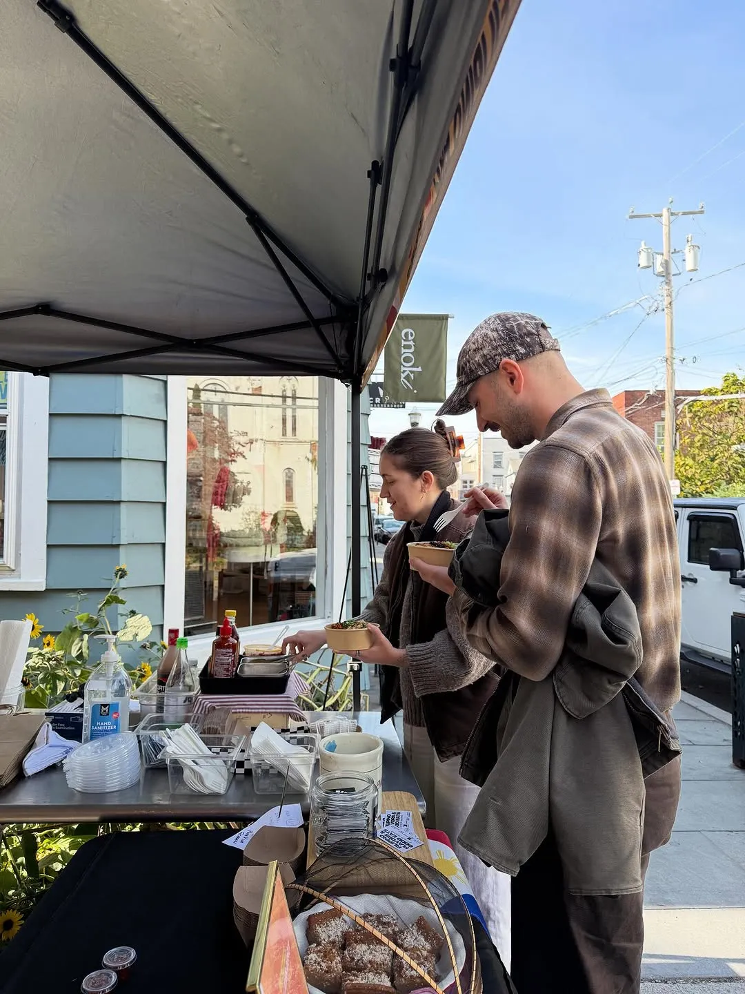 Customers eating at the Enoki Catskills pop-up tent