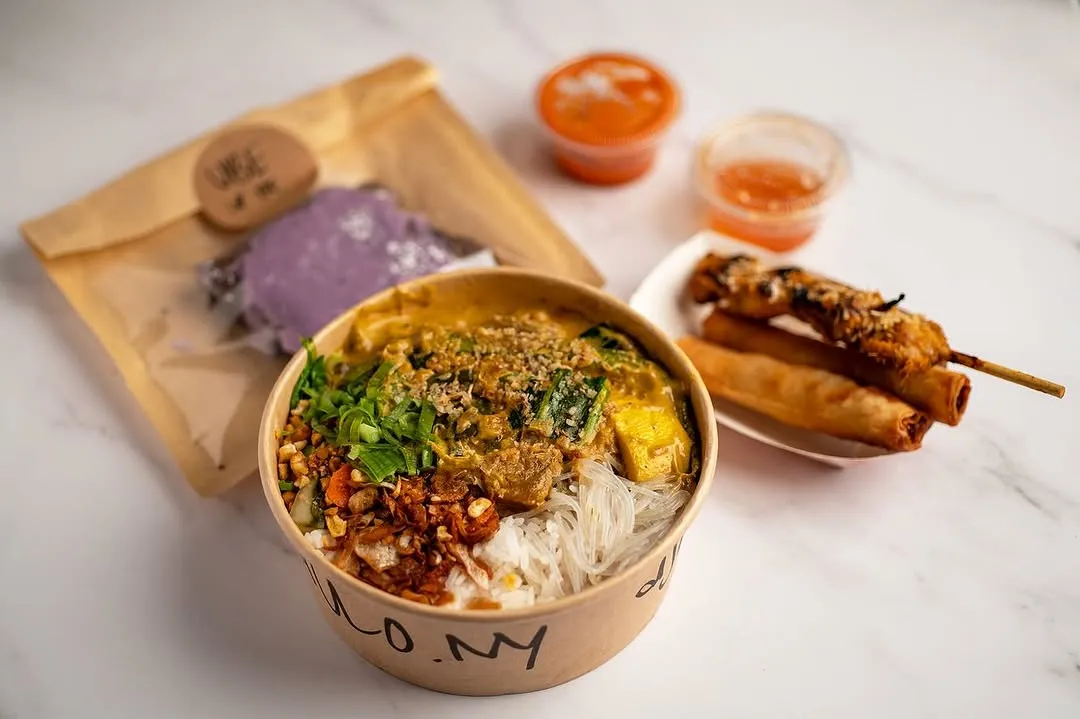 Full kare-kare bowl with lumpia and ube brownie